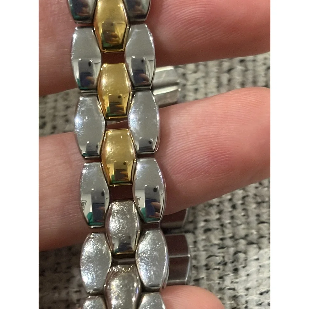 Seiko Oval Women's Two Tone Silver and Gold Wrist  Sunburst Dial Watch 1N00-6F80